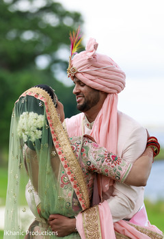 Cute Indian bride and groom's first look capture. Cute Indian bride and groom's first look capture.