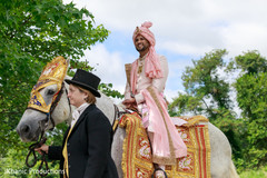 Elegant Indian groom riding baraat white horse. Elegant Indian groom riding baraat white horse.
