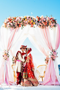 Lovely bride and groom looking into each other Lovely bride and groom looking into each other