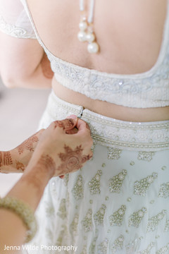 Indian bride getting her lengha on. Indian bride getting her lengha on.