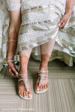 Maharani putting her anklets on. Maharani putting her anklets on.