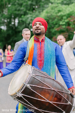 Dhol player during baraat. Dhol player during baraat.