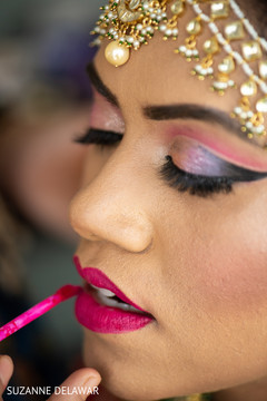 Indian bride being dolled up Indian bride being dolled up