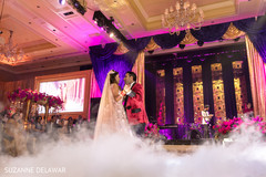 Indian newlyweds dancing in the clouds Indian newlyweds dancing in the clouds
