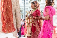 Sweet indian bride about to exchange garlands Sweet indian bride about to exchange garlands