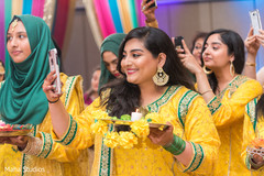 Lovely shot of Indian bridesmaid taking pictures Lovely shot of Indian bridesmaid taking pictures