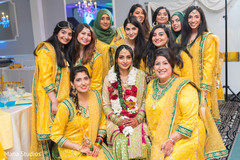 Beautiful Indian bridesmaids pose with the maharani Beautiful Indian bridesmaids pose with the maharani