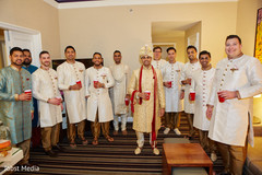 Indian groom toasting with groomsmen Indian groom toasting with groomsmen