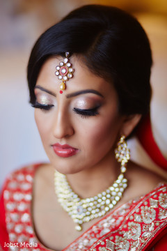 Lovely bride getting her makeup done Lovely bride getting her makeup done