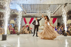 Adorable indian couple dancing during reception Adorable indian couple dancing during reception