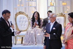 Indian bride enjoying wedding speeches Indian bride enjoying wedding speeches