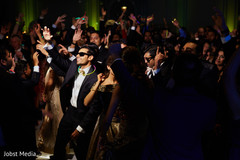 Indian wedding guests showing some dance moves Indian wedding guests showing some dance moves