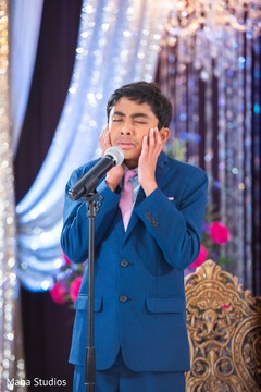 Kid performing during the Indian wedding reception Kid performing during the Indian wedding reception
