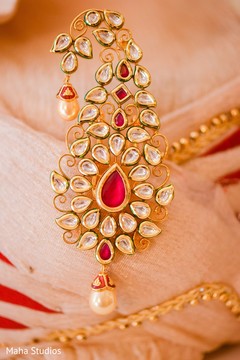 Detail of gem on top of groom's pagri Detail of gem on top of groom's pagri