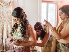 Indian bride glowing in her wedding attire. Indian bride glowing in her wedding attire.