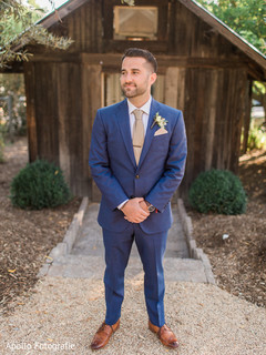 Elegant Indian groom posing outdoors Elegant Indian groom posing outdoors