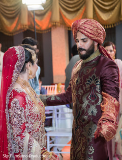 Indian bride and groom dancing Indian bride and groom dancing