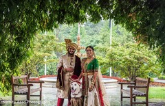 Indian bride and groom posing with pet Indian bride and groom posing with pet