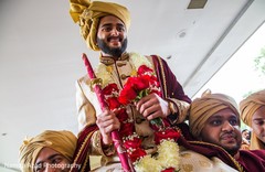 Raja being lifted and holding the kirpan Raja being lifted and holding the kirpan