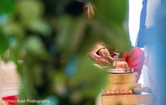 Detail photo of a moment during the rituals Detail photo of a moment during the rituals