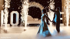 Indian bride and groom having their first dance Indian bride and groom having their first dance