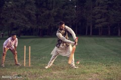 Indian groom playing cricket Indian groom playing cricket