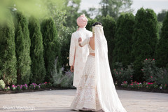 Sweet and lovely Indian bride's and groom's first look scene. Sweet and lovely Indian bride's and groom's first look scene.
