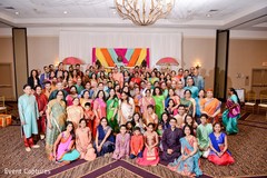 Indian bride and groom with sangeet guests capture. Indian bride and groom with sangeet guests capture.