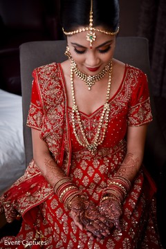 Enchanting Indian bride showing her henna art. Enchanting Indian bride showing her henna art.