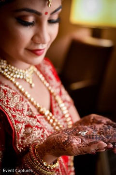 Maharani looking at her engagement ring. Maharani looking at her engagement ring.