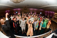 Cheerful indian wedding reception dance. Cheerful indian wedding reception dance.