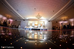 Stunning Indian wedding reception stage decor. Stunning Indian wedding reception stage decor.