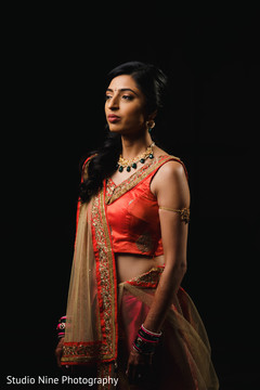 Gorgeous Indian bride posing on her sangeet outfit. Gorgeous Indian bride posing on her sangeet outfit.