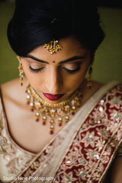 Stunning Indian bride with tikka. Stunning Indian bride with tikka.