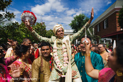 Indian groom with groomsmen during baraat Indian groom with groomsmen during baraat