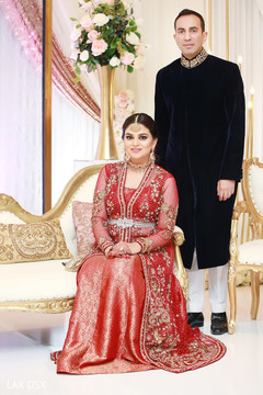 Amazing shot of maharani and raja posing during the photo shoot Amazing shot of maharani and raja posing during the photo shoot