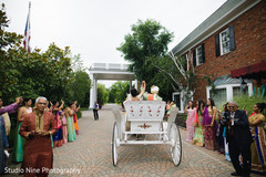 Lovely capture of bride and groom leaving wedding on carriage. Lovely capture of bride and groom leaving wedding on carriage.