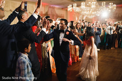 Ravishing Indian bride and groom making their entrance. Ravishing Indian bride and groom making their entrance.