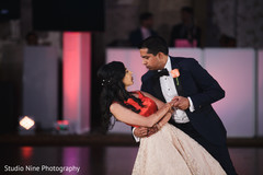 Indian lovebirds having their first dance. Indian lovebirds having their first dance.