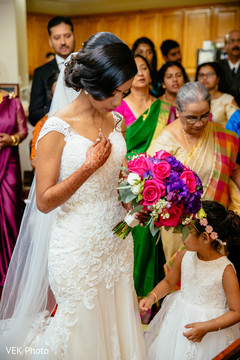 Indian bride making her entrance to the ceremony Indian bride making her entrance to the ceremony