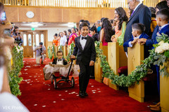 Enchanting kid guests making their entrance to the ceremony Enchanting kid guests making their entrance to the ceremony