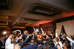 Indian wedding guests cheering for the newlyweds Indian wedding guests cheering for the newlyweds