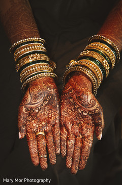 Indian bride showing her amazing mehndi design Indian bride showing her amazing mehndi design