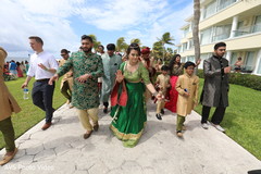 Upbeat Indian and bridesmaid and groomsmen at baraat capture. Upbeat Indian and bridesmaid and groomsmen at baraat capture.