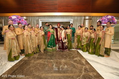 Gorgeus Indian couple posing with bridesmaids and groomsmen. Gorgeus Indian couple posing with bridesmaids and groomsmen.