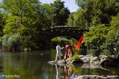 Beautiful shot of maharani and Indian groom by a lake Beautiful shot of maharani and Indian groom by a lake