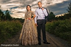 Glamorous Indian bride posing with groom. Glamorous Indian bride posing with groom.