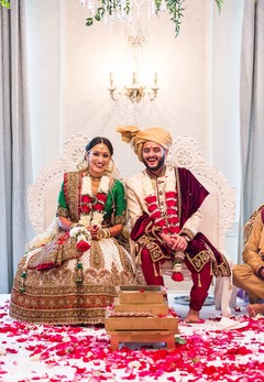Gorgeous Indian bride and groom looking at camera. Gorgeous Indian bride and groom looking at camera.