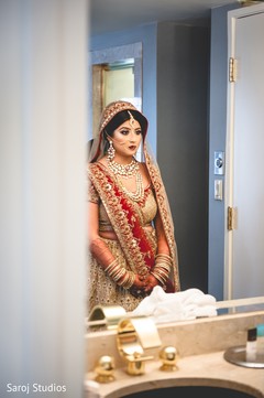 Indian bride glowing in her wedding attire. Indian bride glowing in her wedding attire.