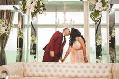 Indian newlyweds kissing during the photo session Indian newlyweds kissing during the photo session